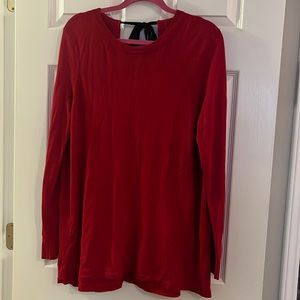 Red sweater with black ribbon tie
